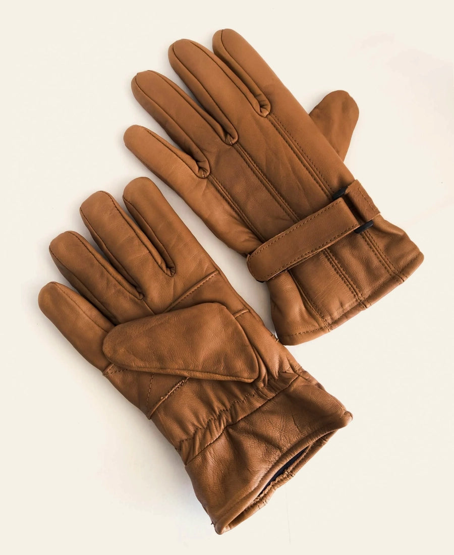 John Dutton Yellowstone Pair of brown leather gloves on a beige background