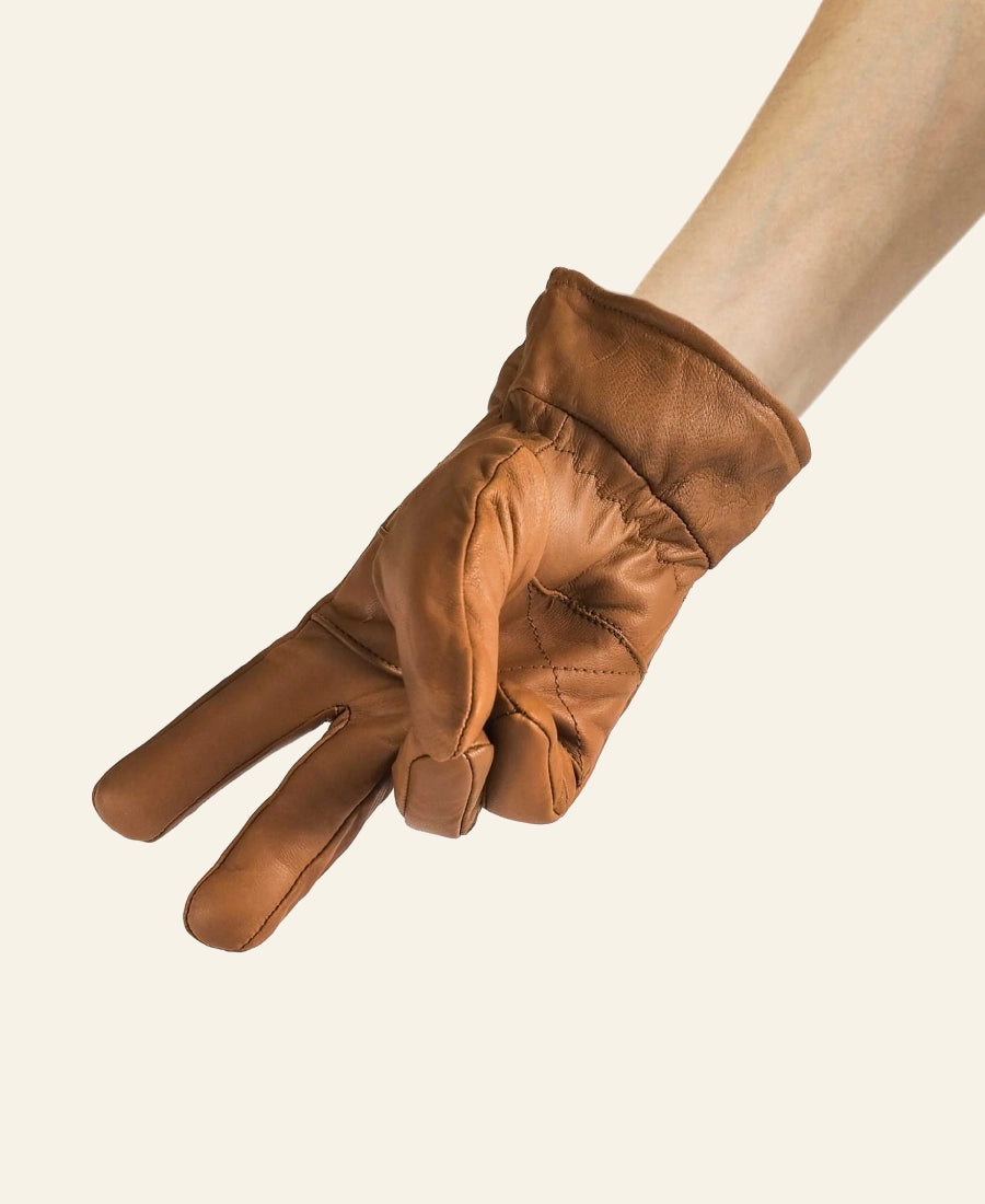 John Dutton Yellowstone Brown leather glove on a beige background