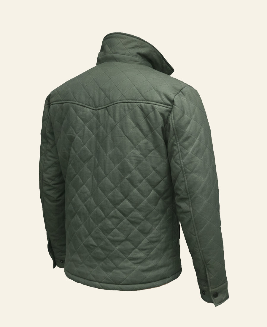 Green quilted jacket on a beige background back side 