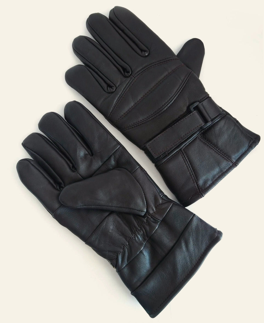 Rip Wheeler Yellowstone Pair of black leather gloves on a light beige background
