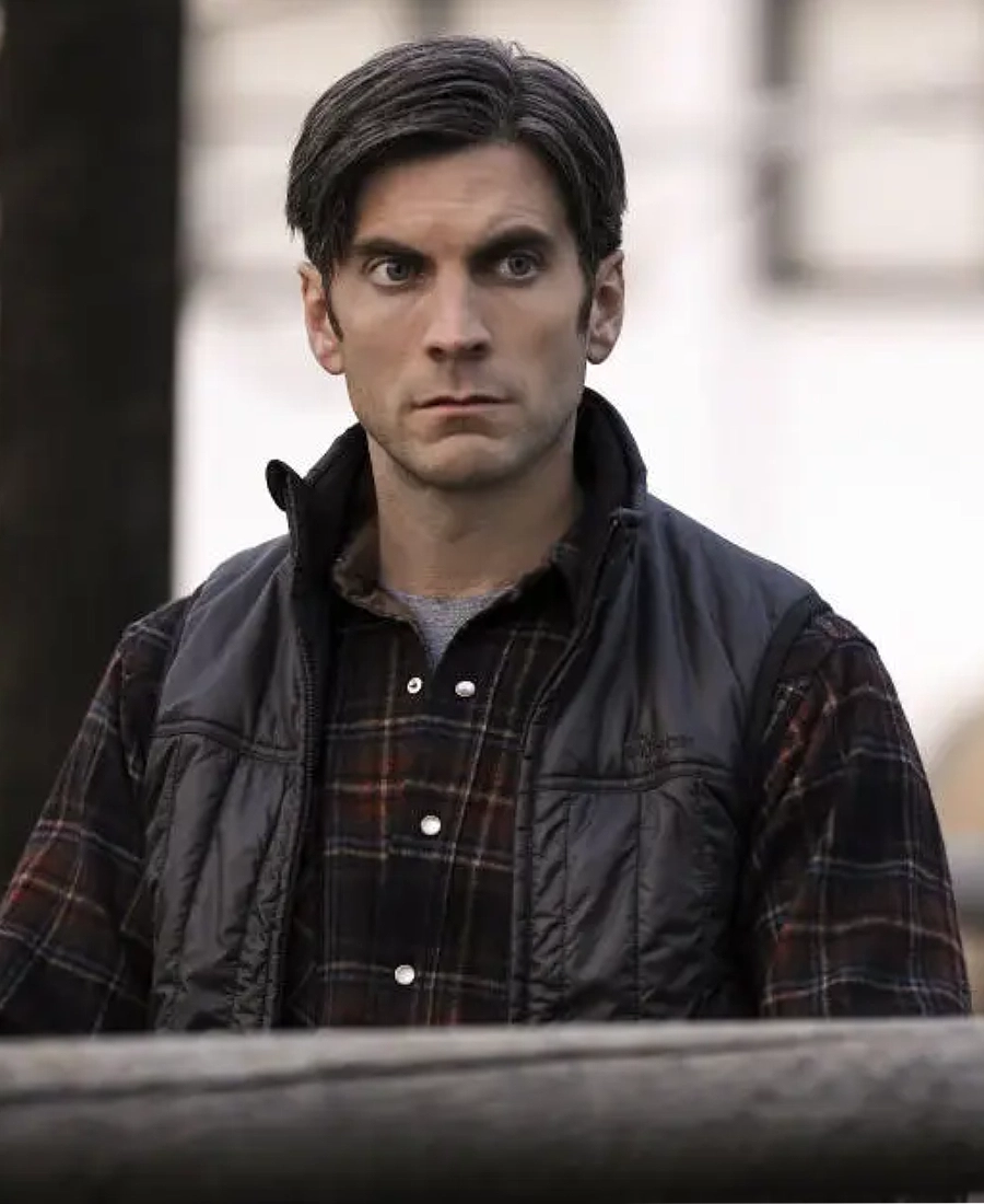 amie dutton black quilted vest yellowstone Man wearing a black jacket