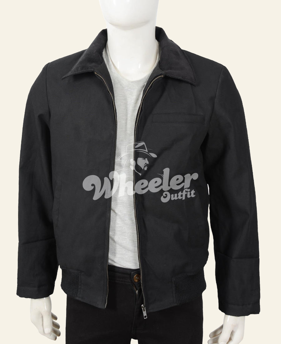 Black jacket with 'john dutton black cotton yellowstone' logo on a mannequin against a white background