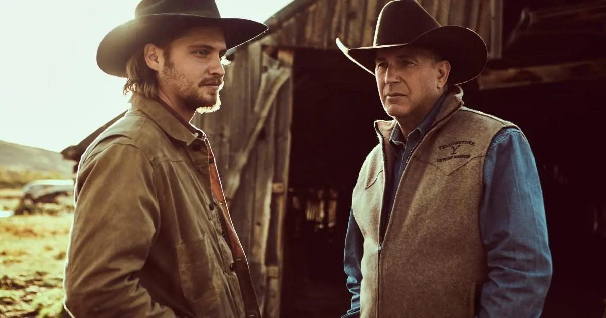 Two men in cowboy hats standing in a rustic outdoor setting john dutton wool vest