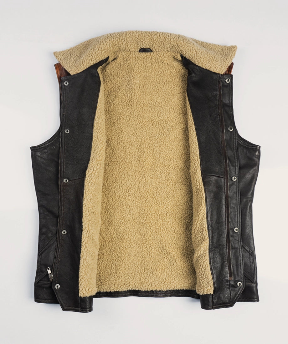 Black leather vest with beige fleece lining on a white background