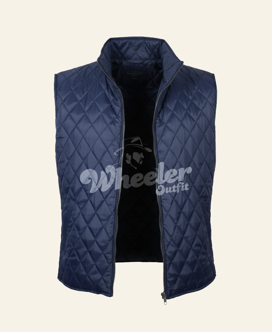 yellowstone john dutton blue quilted vest on a beige background
