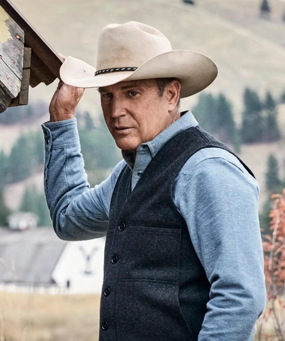 Man wearing a cowboy hat and vest in a scenic outdoor setting Yellow stone John Dutton 