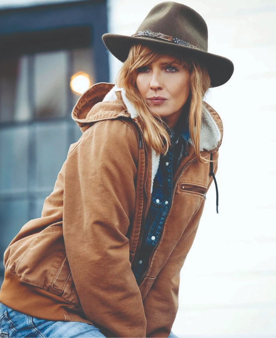 Woman wearing a Beth dutton brown jacket Yellowstone 
