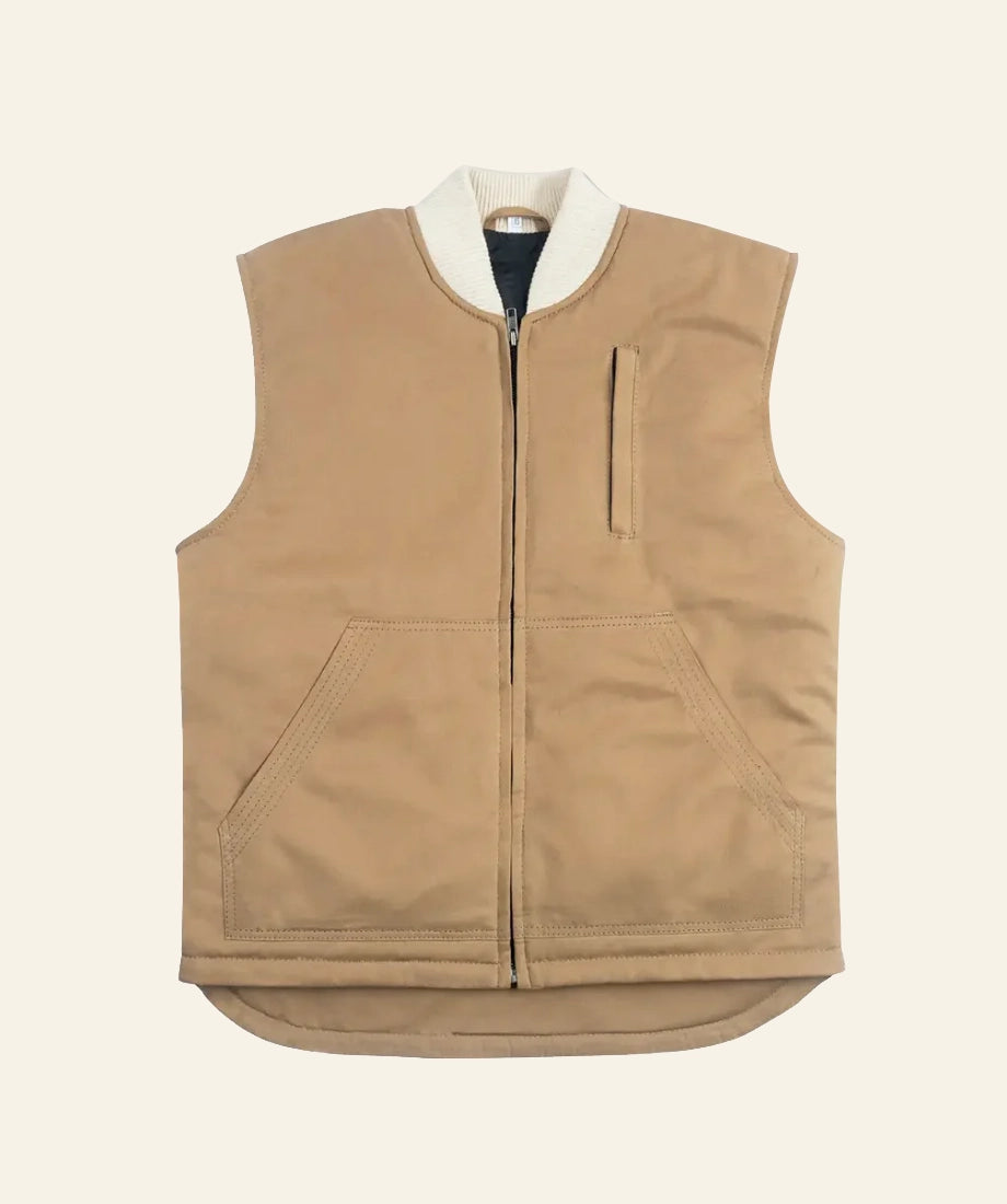 Beige vest with white collar on a beige background