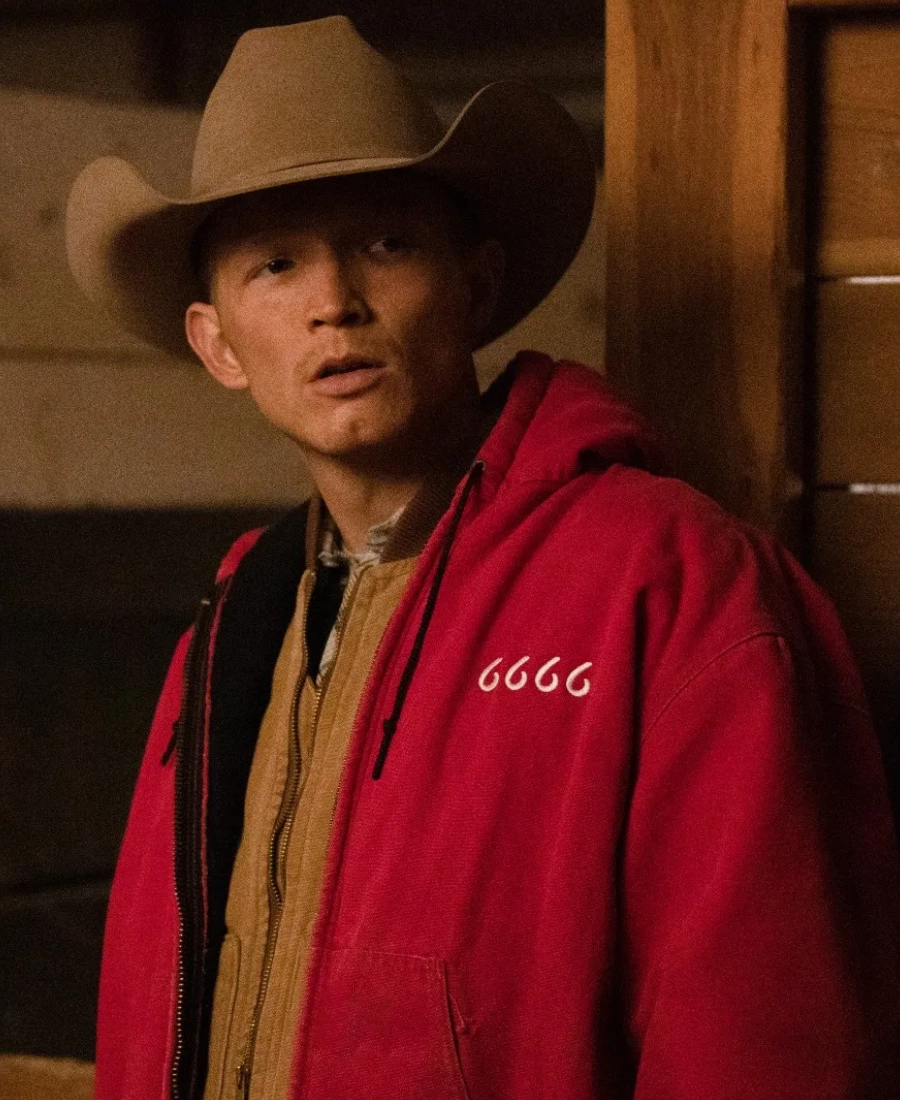 Jimmy Hurd strom wearing a red jacket with '6666' on it and a cowboy hat indoors.