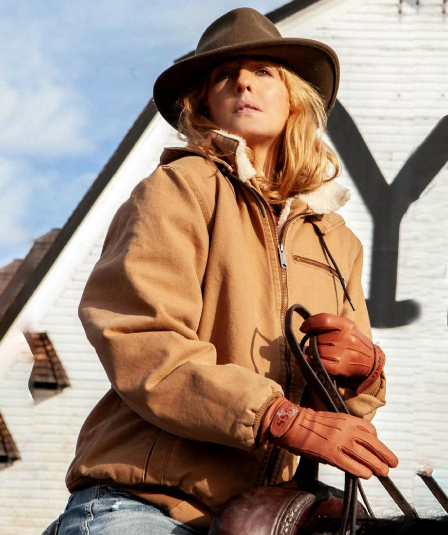 Beth Dutton wearing a brown jacket, hat, and gloves holding a horse bridle against a white wall with a large letter 'Y' Yellowstone Logo