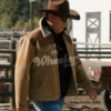 Yellowstone John Dutton wearing a brown Raw leather jacket with sunglasses, and a cowboy hat in an outdoor setting.