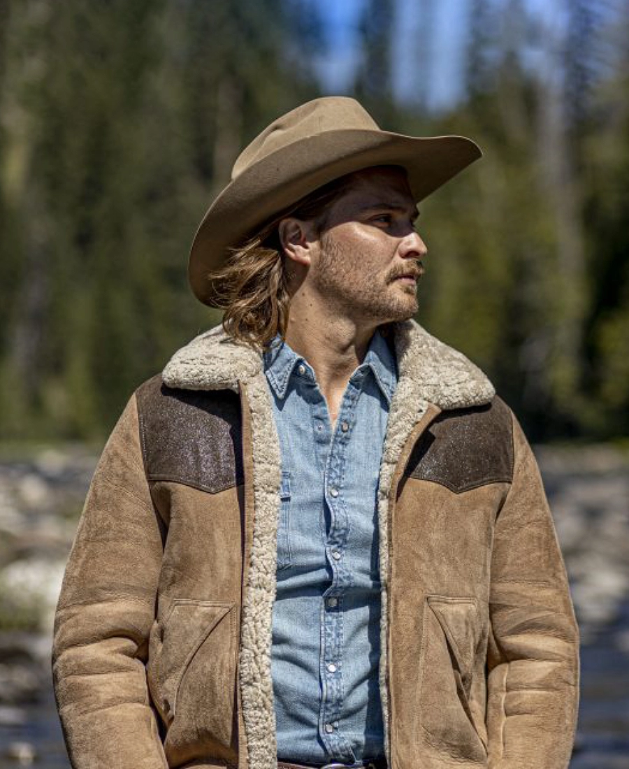 Kayce Dutton wearing a Suede Leather Brown jacket with shearling collar and a cowboy hat..