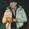 John in a beige jacket and cowboy hat holding a rifle yellowstone john dutton white leather jacket